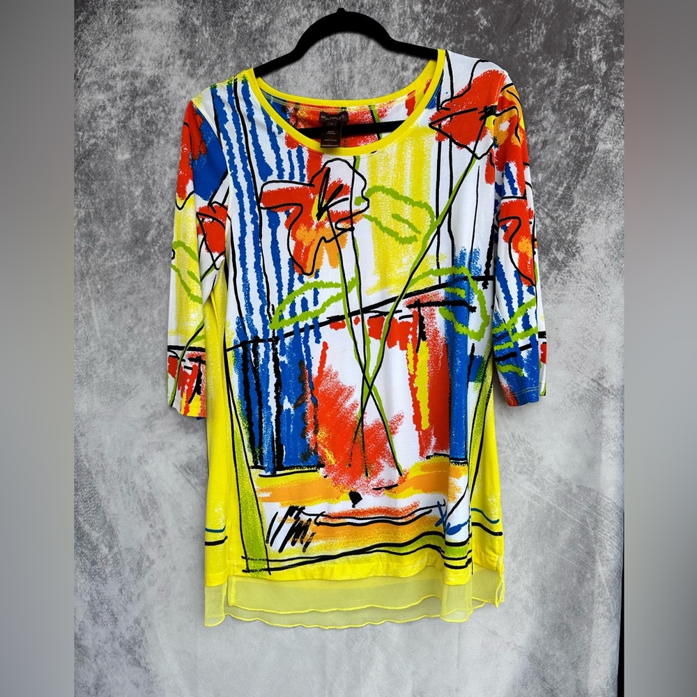 Multiples flowing colorful abstract top with shear trim on bottom